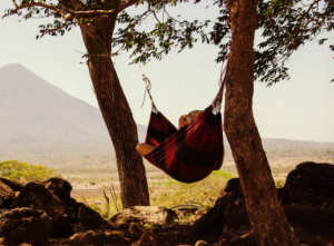 2017-12-21 19_31_08-Person Lying on Black and Red Hammock Beside Mountain Under White Cloudy Sky dur