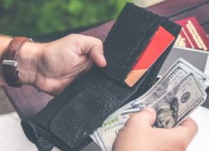 2019-04-10 20_56_45-Man Holding U.s Dollar Banknotes and Black Leather Bi-fold Wallet · Free Stock P