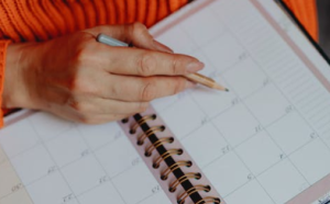 2019-05-08 22_11_52-Person Holding White Book Planner · Free Stock Photo