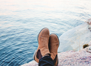 2019-10-21 09_52_20-person sitting on gray rock beside body of water during daytime photo – Free Per