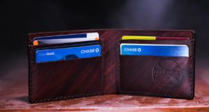 2019-10-27 20_16_46-brown leather bifold wallet on table photo – Free Wallet Image on Unsplash
