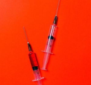 2020-05-13 07_56_42-Syringes on Red Background · Free Stock Photo