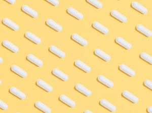 2020-06-05 21_11_06-White Capsules on Yellow Background · Free Stock Photo